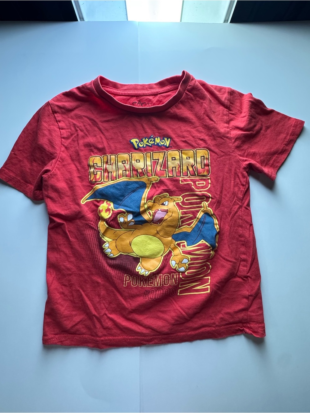 Pokemon Red Charizard Graphic Tee with Blue Accents
